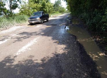 Precaución baches en ruta alterna