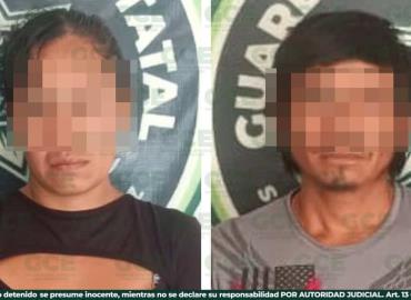 Pareja arrestada por agredir a los policías